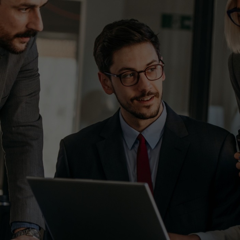 Man wearing suit and talking people